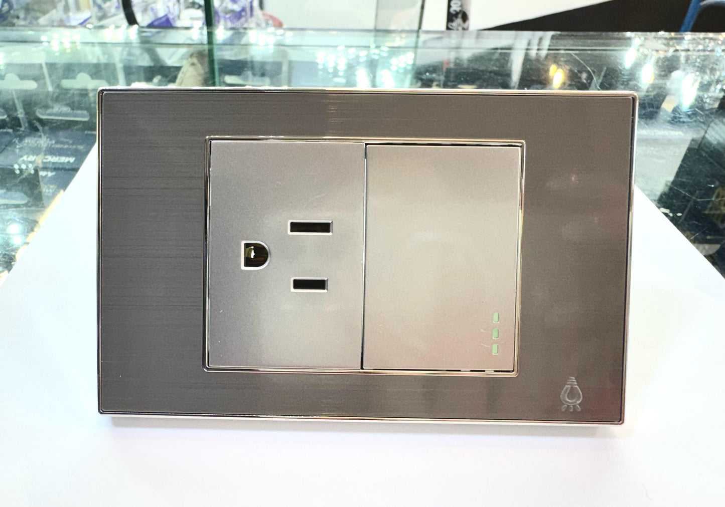 Interruptor + Toma Premium Stainless